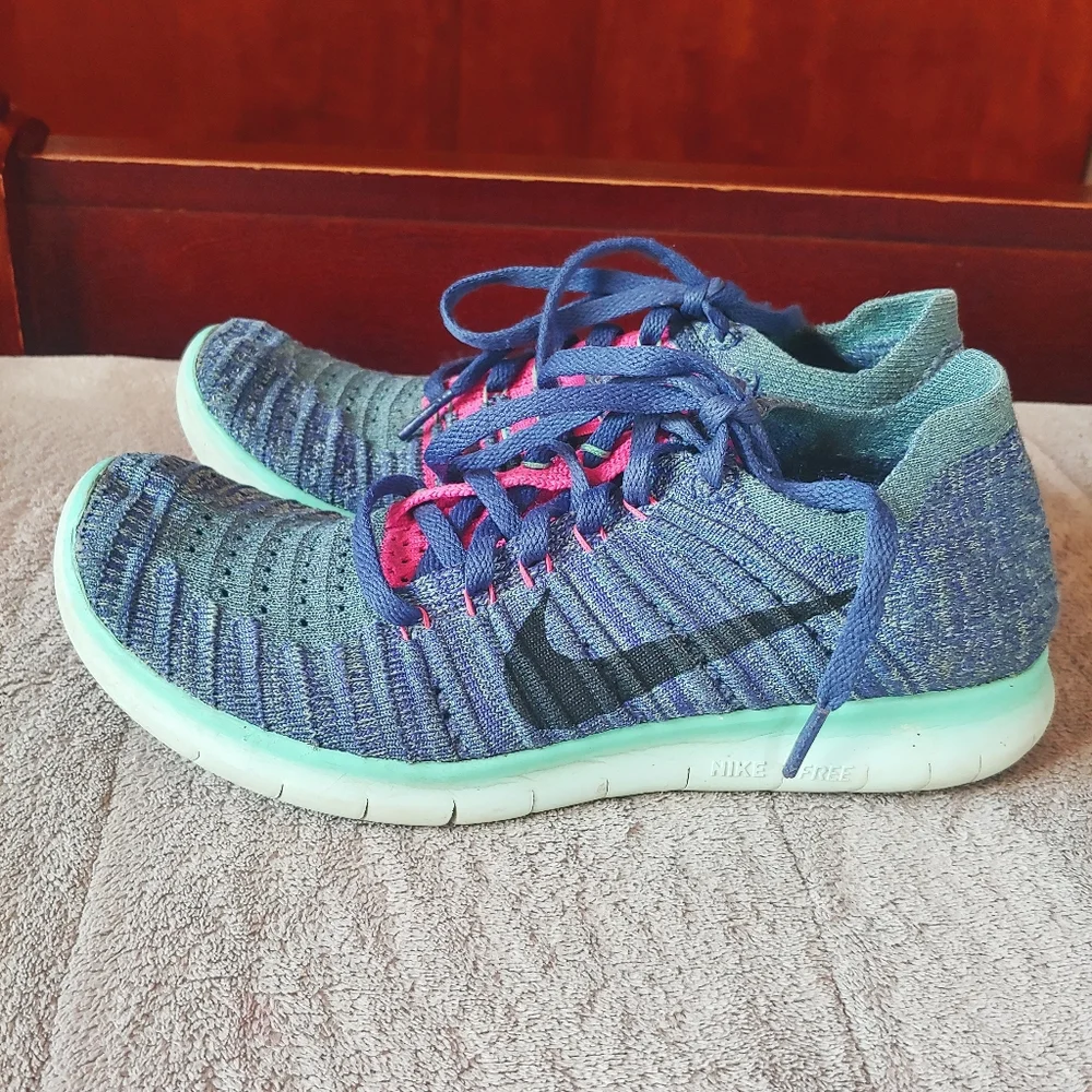 Nike Women’s Running Shoe in Purple, Pink & Teal with Black Swoosh